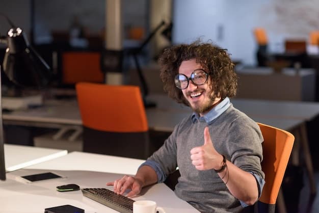 A developer looking satisfied after committing a small code change