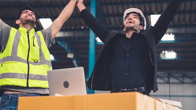 A person celebrating with a laptop, symbolizing successful shipping