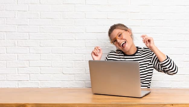 A person happily typing on a laptop, with a small checkmark indicating completion