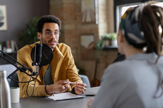 A person having a focused conversation with another person, possibly a user interview