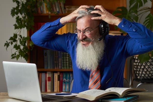 A solo founder looking overwhelmed at a computer desk