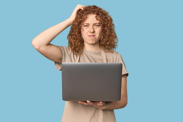 A user looking confused while interacting with a website on a laptop.